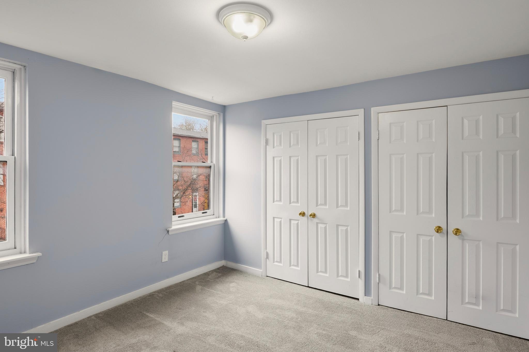 636 Portland Street Baltimore, MD 21230 - Photo 11 of 20 an empty room with windows