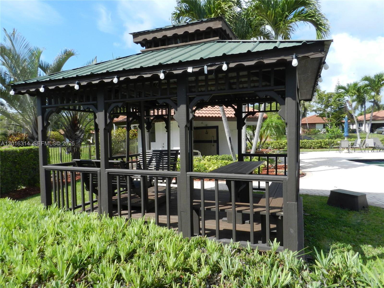 305 Northwest 42nd Street Boca Raton, FL 33431 - Photo 29 of 31 an outdoor space with seating