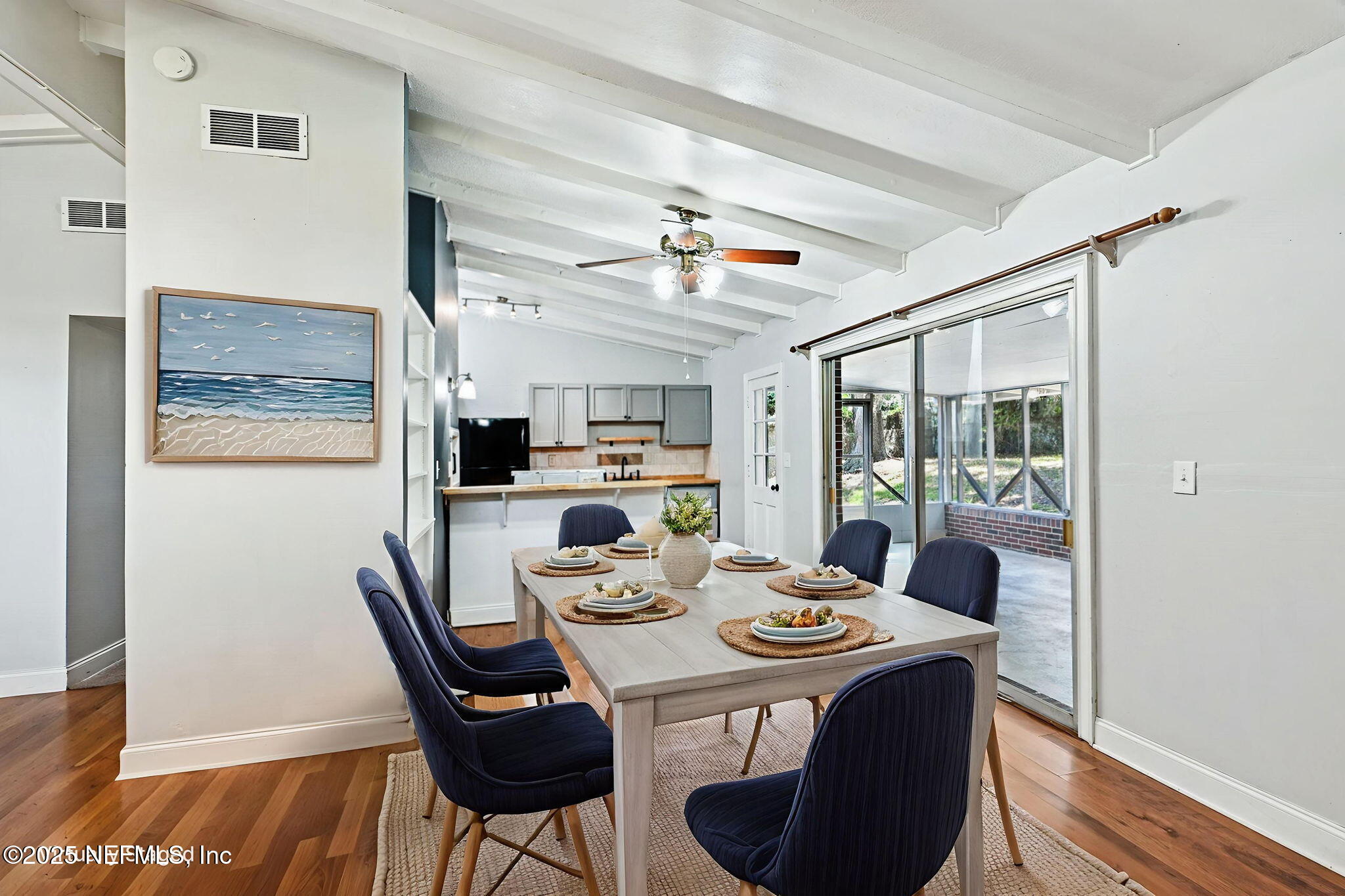 4619 Morris Road Jacksonville, FL 32225 - Photo 15 of 56 a view of a dining room with furniture window and wooden floor