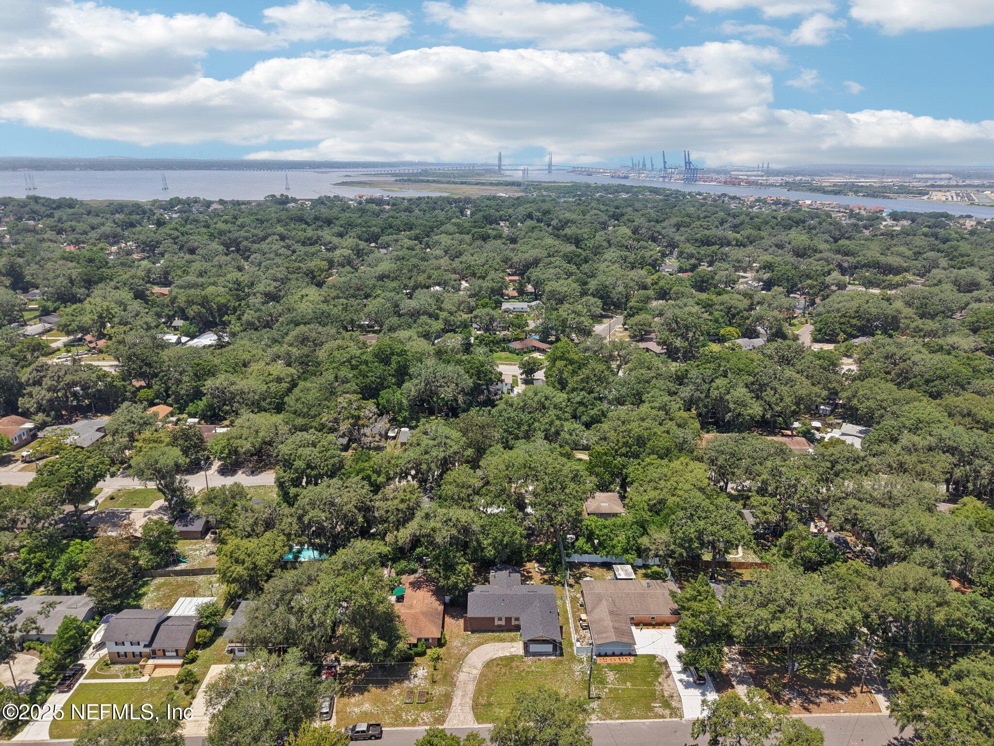 4619 Morris Road Jacksonville, FL 32225 - Photo 48 of 56 an aerial view of a city with lots of residential buildings