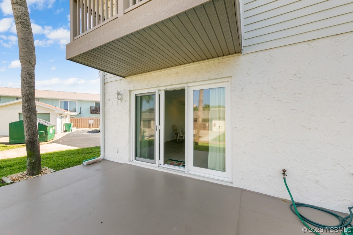 4790 South Atlantic Avenue, Unit F601 Ponce Inlet, FL 32127 - Photo 11 of 37 a porch with seating space