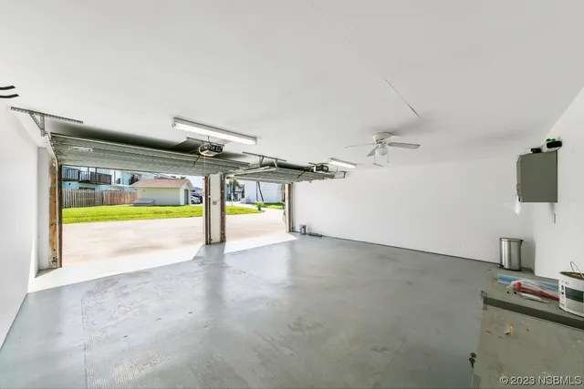 an aerial view of residential building and lake
