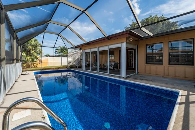 a view of a porch with wooden floor and outdoor space