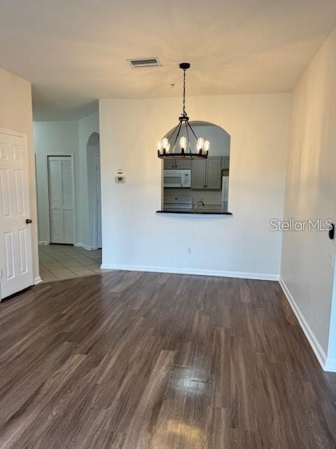 13584 Turtle Marsh Loop, Unit 132 Orlando, FL 32837 - Photo 7 of 21 a view of a room with wooden floor