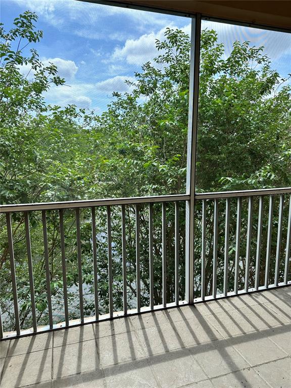 13584 Turtle Marsh Loop, Unit 132 Orlando, FL 32837 - Photo 10 of 21 a view of a wooden fence