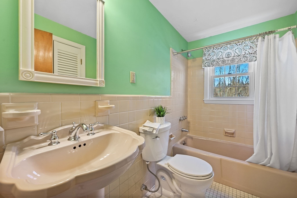 48 Grapevine Avenue Lexington, MA 02421 - Photo 17 of 34 a bathroom with a sink toilet and shower