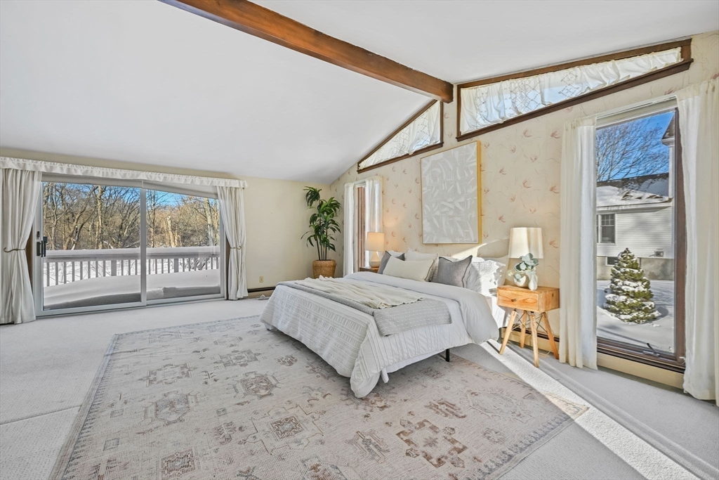 48 Grapevine Avenue Lexington, MA 02421 - Photo 19 of 34 a spacious bedroom with a large bed and a window