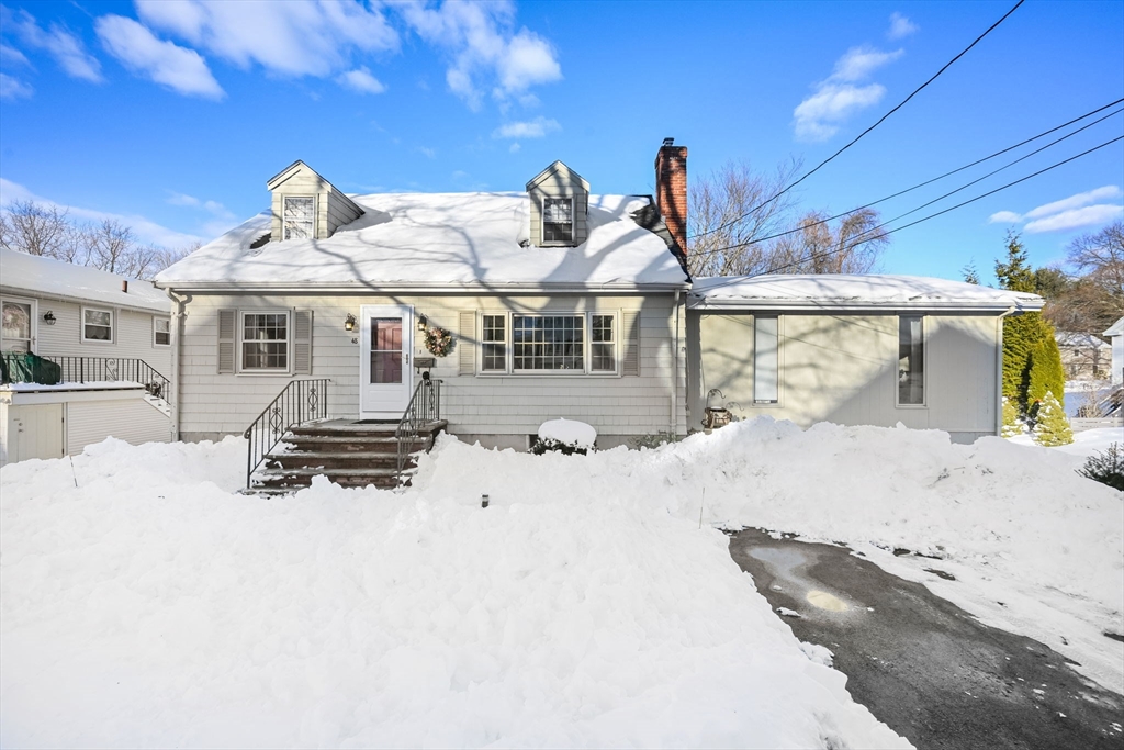 48 Grapevine Avenue Lexington, MA 02421 - Photo 2 of 34 a white house with a large tree in front of it