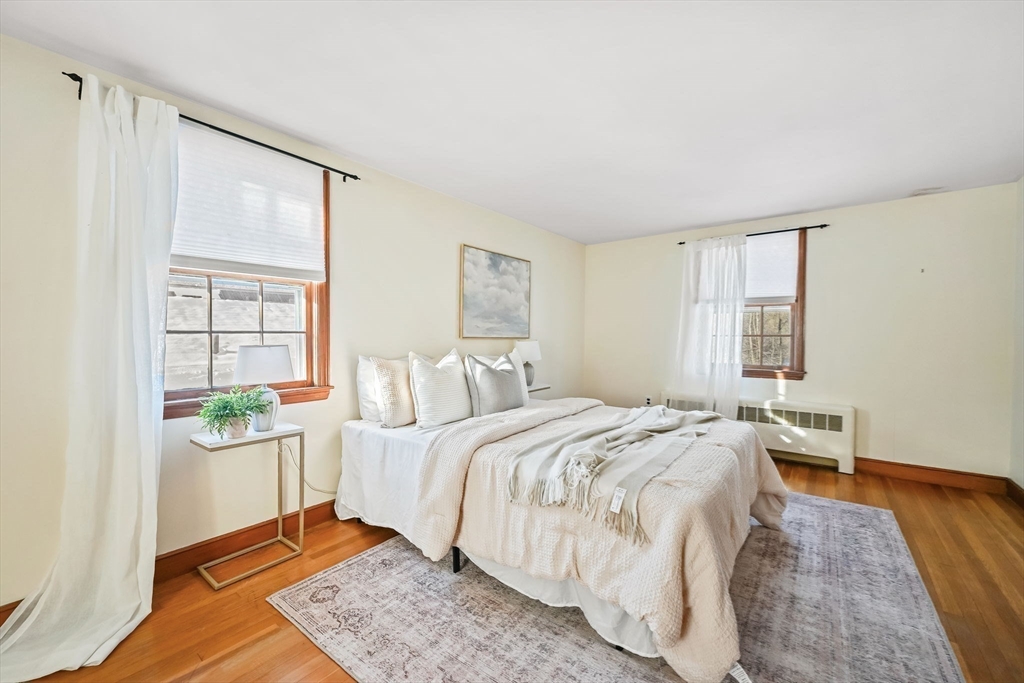 48 Grapevine Avenue Lexington, MA 02421 - Photo 25 of 34 a bed room with a bed and a window