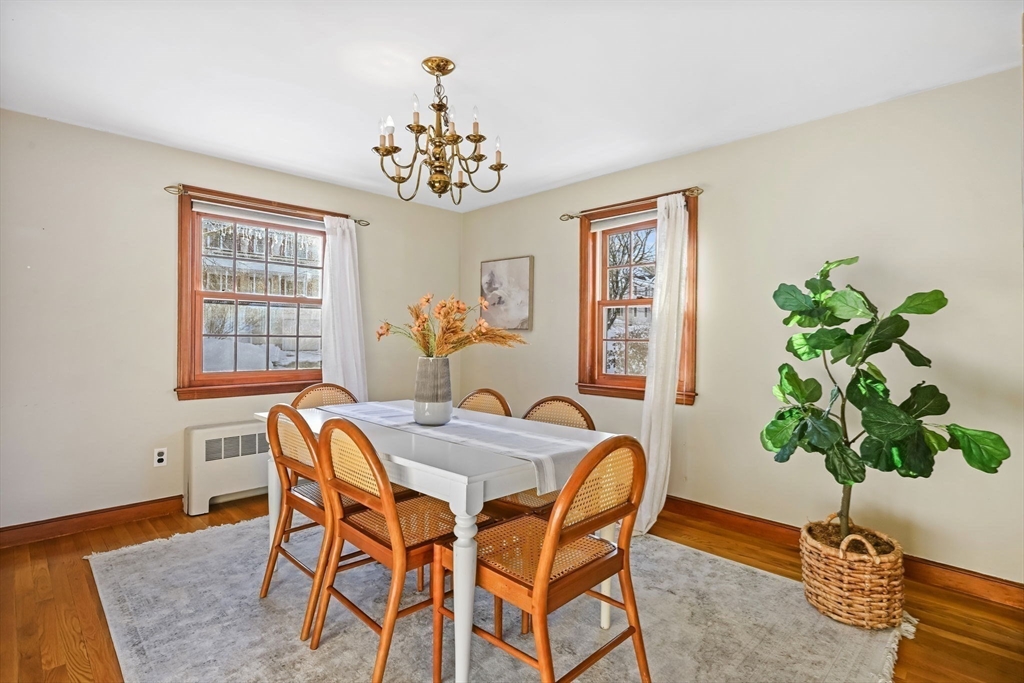 48 Grapevine Avenue Lexington, MA 02421 - Photo 10 of 34 a view of a dining room with furniture window and wooden floor
