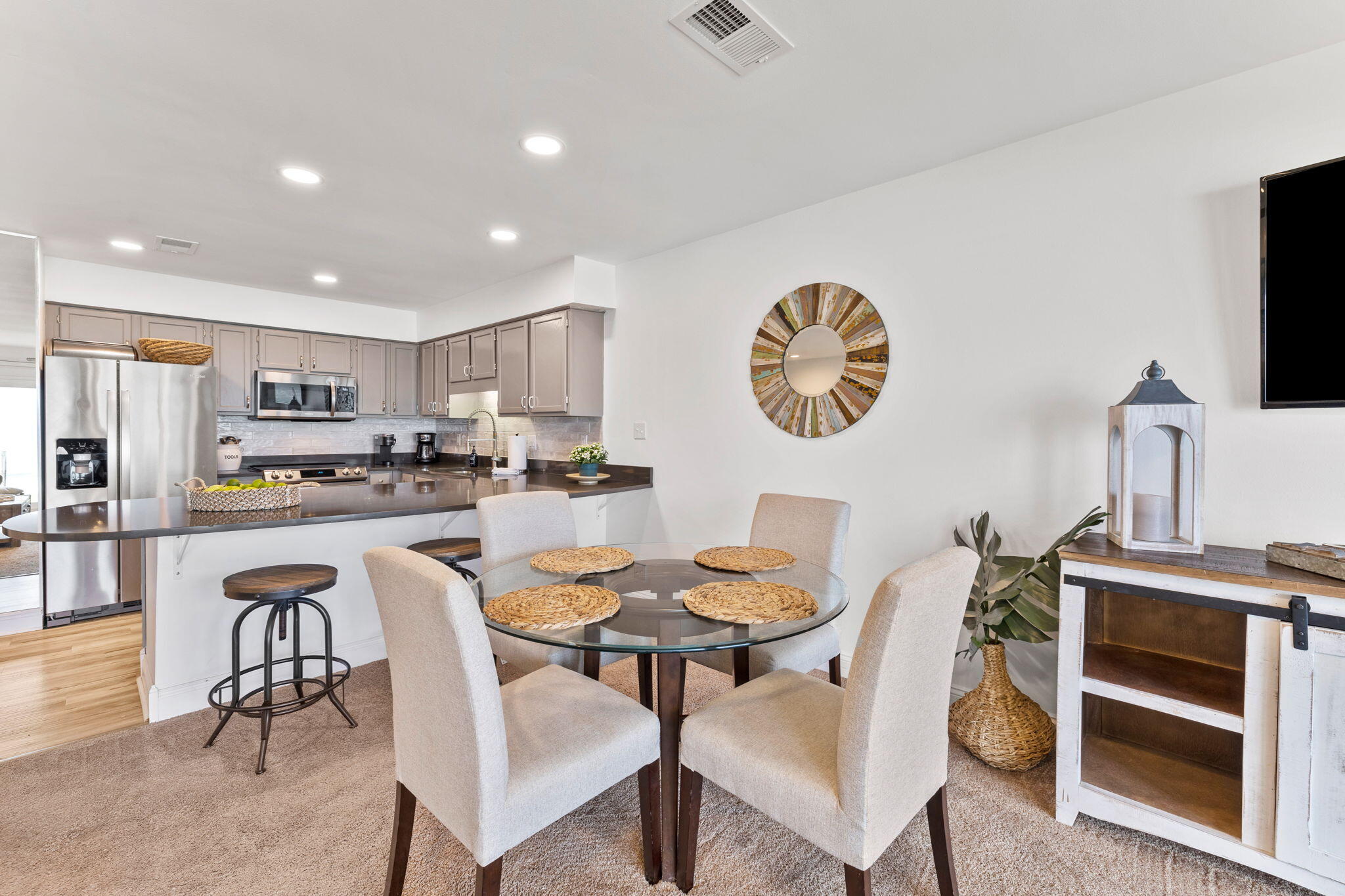 214 Blue Mountain Road, Unit 114 Santa Rosa Beach, FL 32459 - Photo 7 of 39 a dining room with furniture and a kitchen view