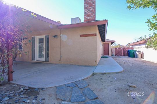 516 Randall Street Ridgecrest, CA 93555 - Photo 48 of 50 a view of a house with a backyard