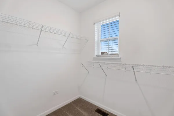 a view of a room with racks on the wall