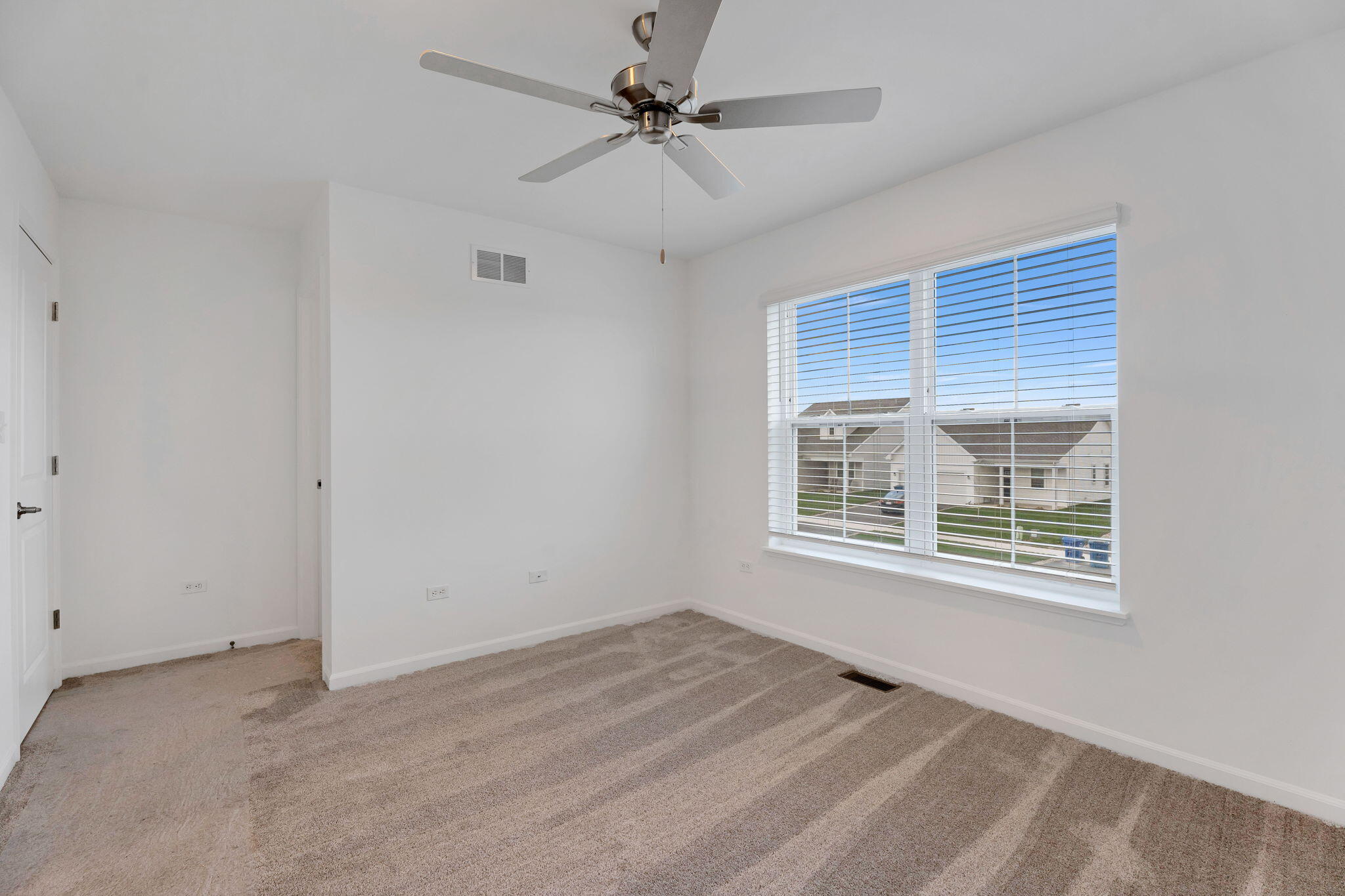 471 East 127th Place Crown Point, IN 46307 - Photo 17 of 27 a view of an empty room with a window
