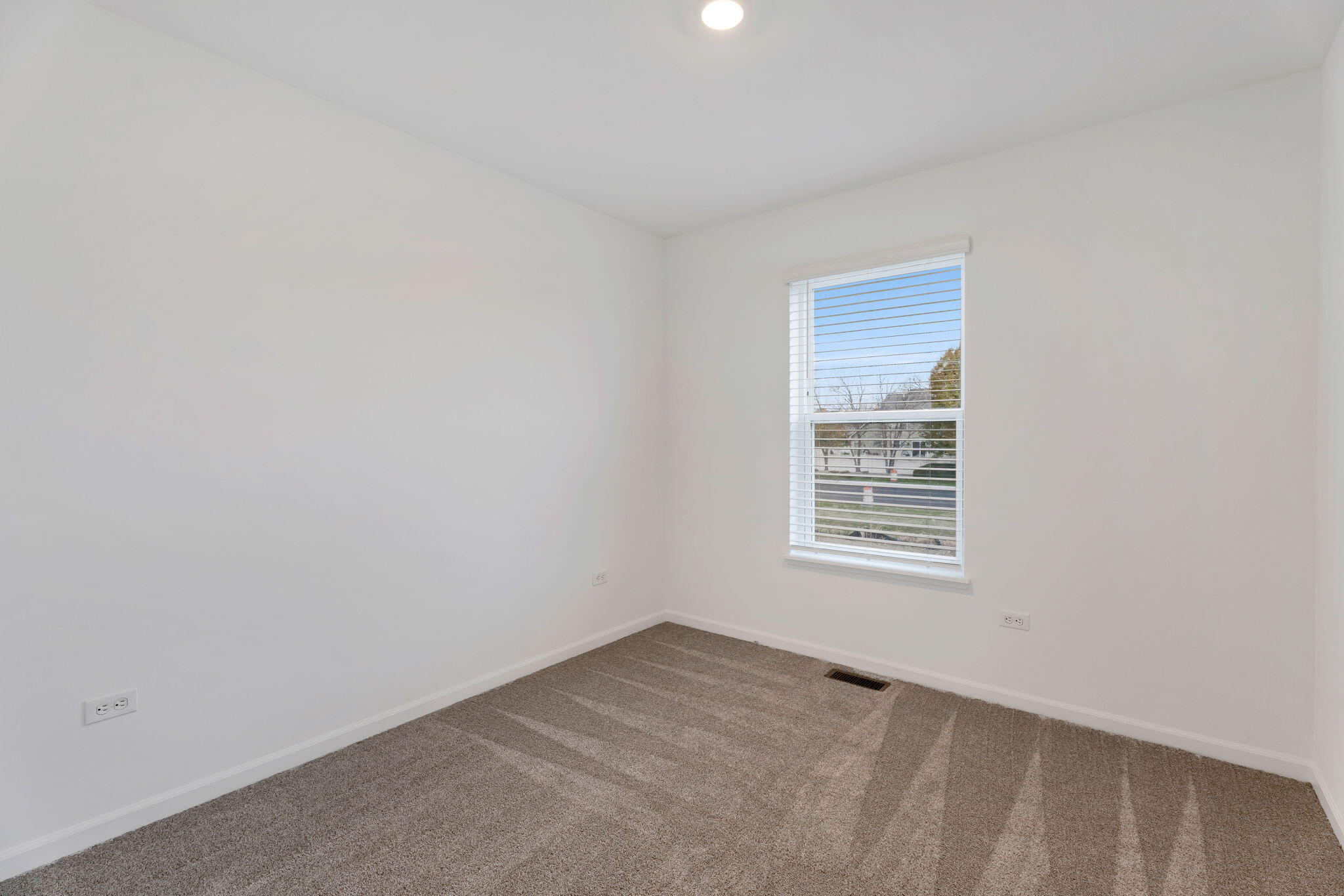 471 East 127th Place Crown Point, IN 46307 - Photo 22 of 27 a view of an empty room with a window
