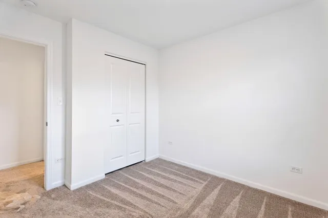 a view of a room with white walls