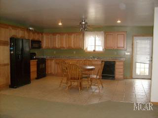 11740 Fessner Road Carleton, MI 48117 - Photo 4 of 9 Tiled kitchen