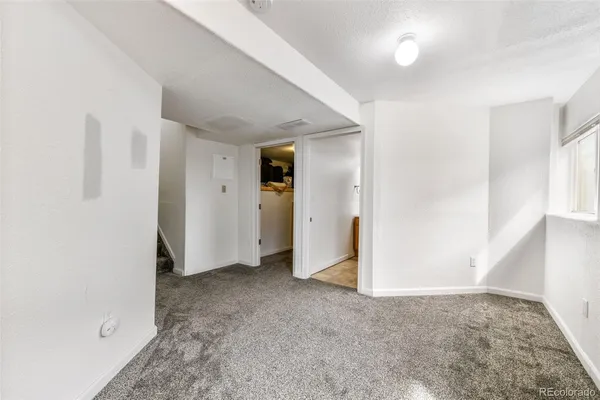 an empty room with a natural light