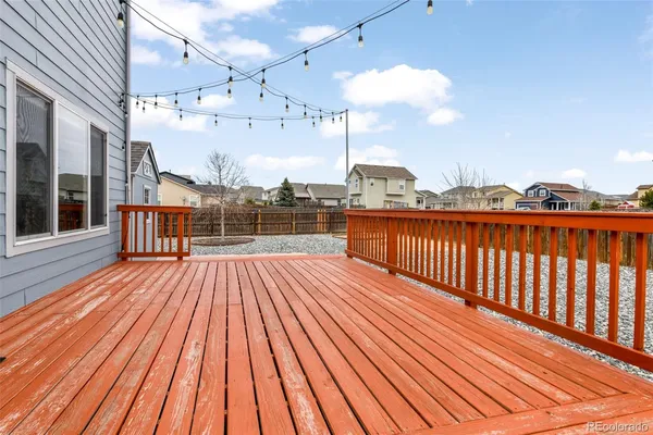 a view of balcony with wooden floor
