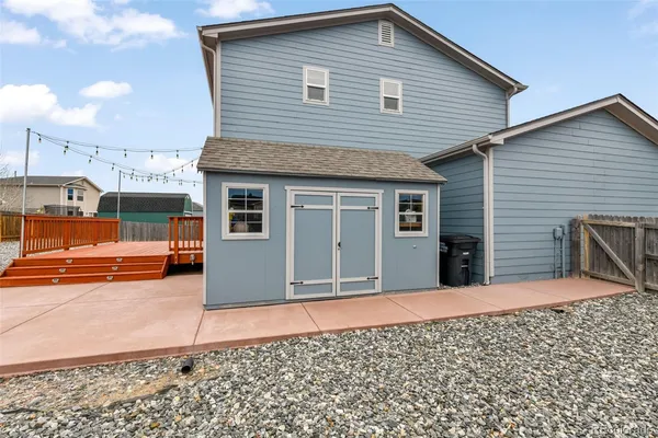 a front view of a house with a garage