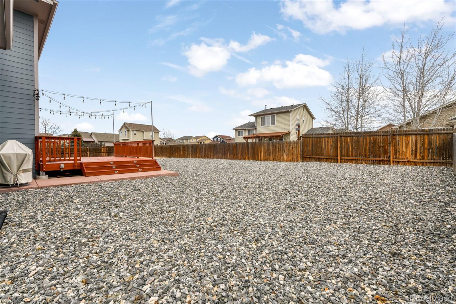 12906 Oakland Hills Road Peyton, CO 80831 - Photo 37 of 50 a front view of a house with a yard
