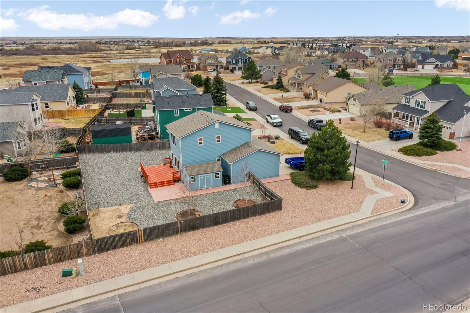 12906 Oakland Hills Road Peyton, CO 80831 - Photo 43 of 50 an aerial view of a house with a garden