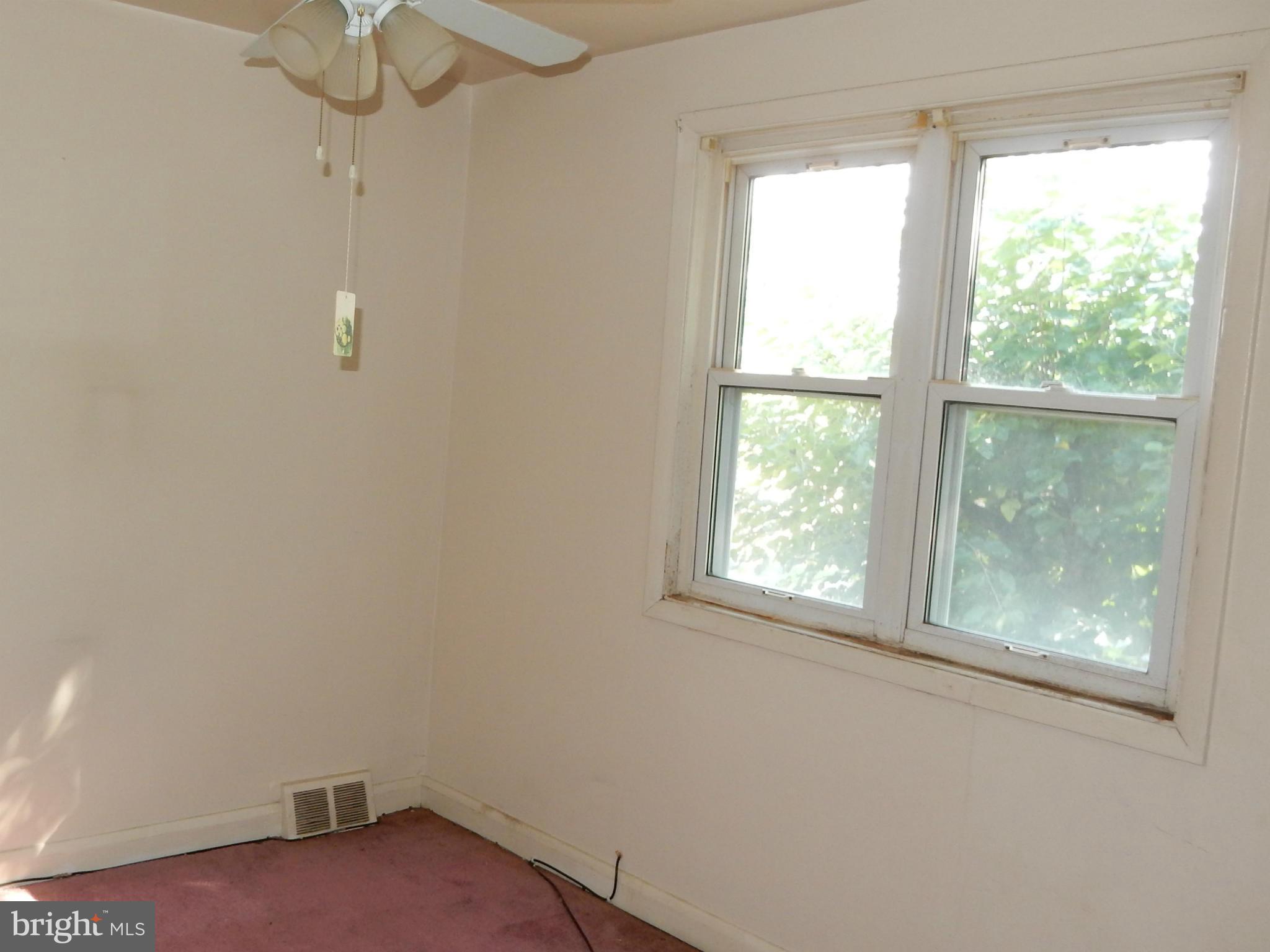 1817 Swansea Road Baltimore, MD 21239 - Photo 8 of 8 a view of a small space with a window