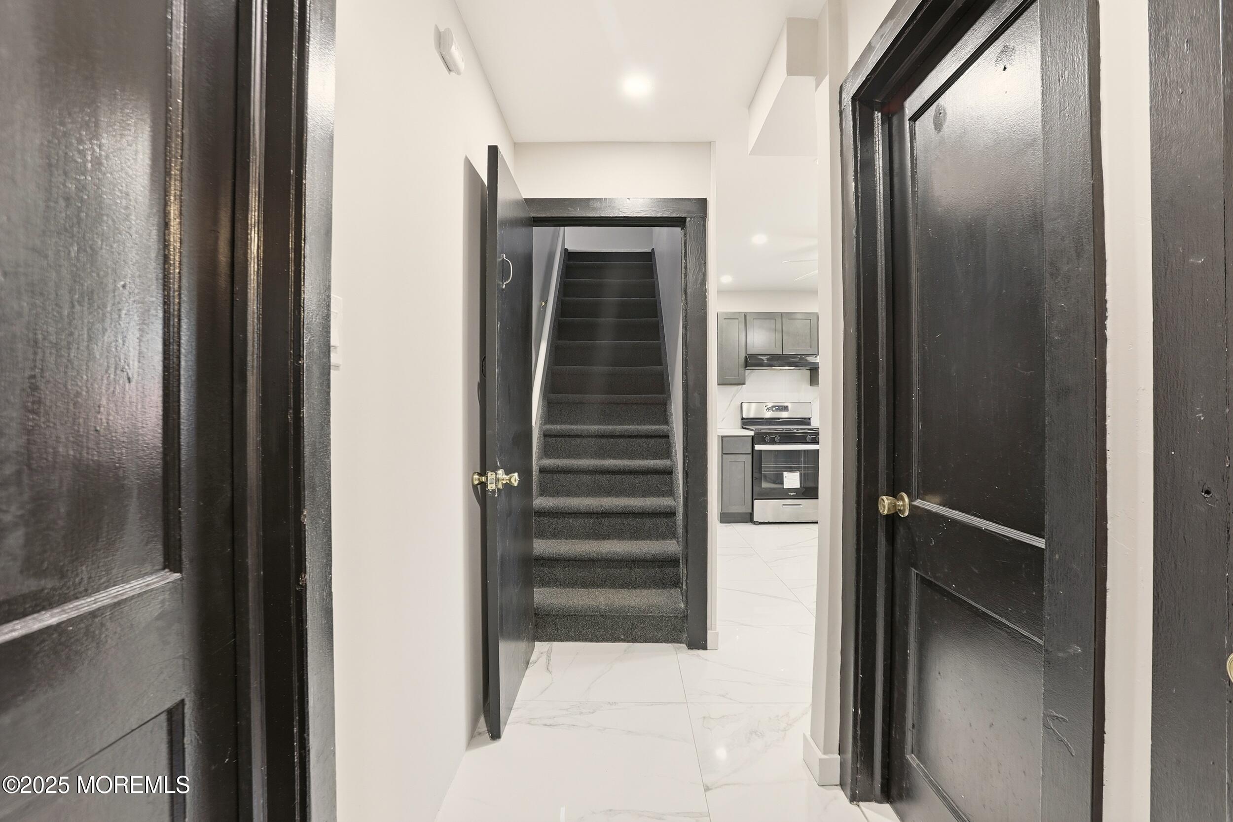 22 Oak Ridge Parkway Toms River, NJ 08755 - Photo 17 of 28 a view of staircase with wooden floor