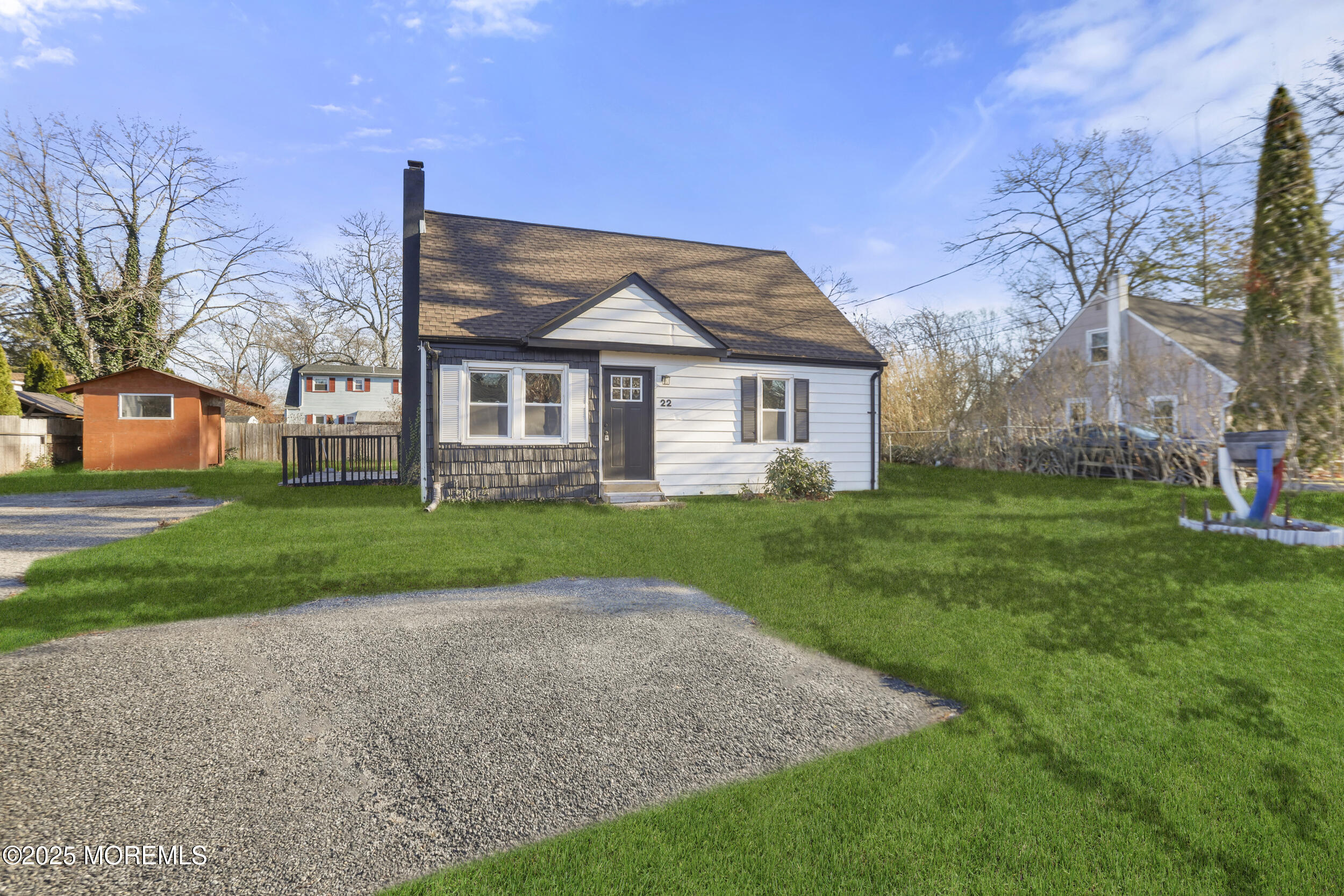 22 Oak Ridge Parkway Toms River, NJ 08755 - Photo 2 of 28 a view of house in front of a big yard with large trees