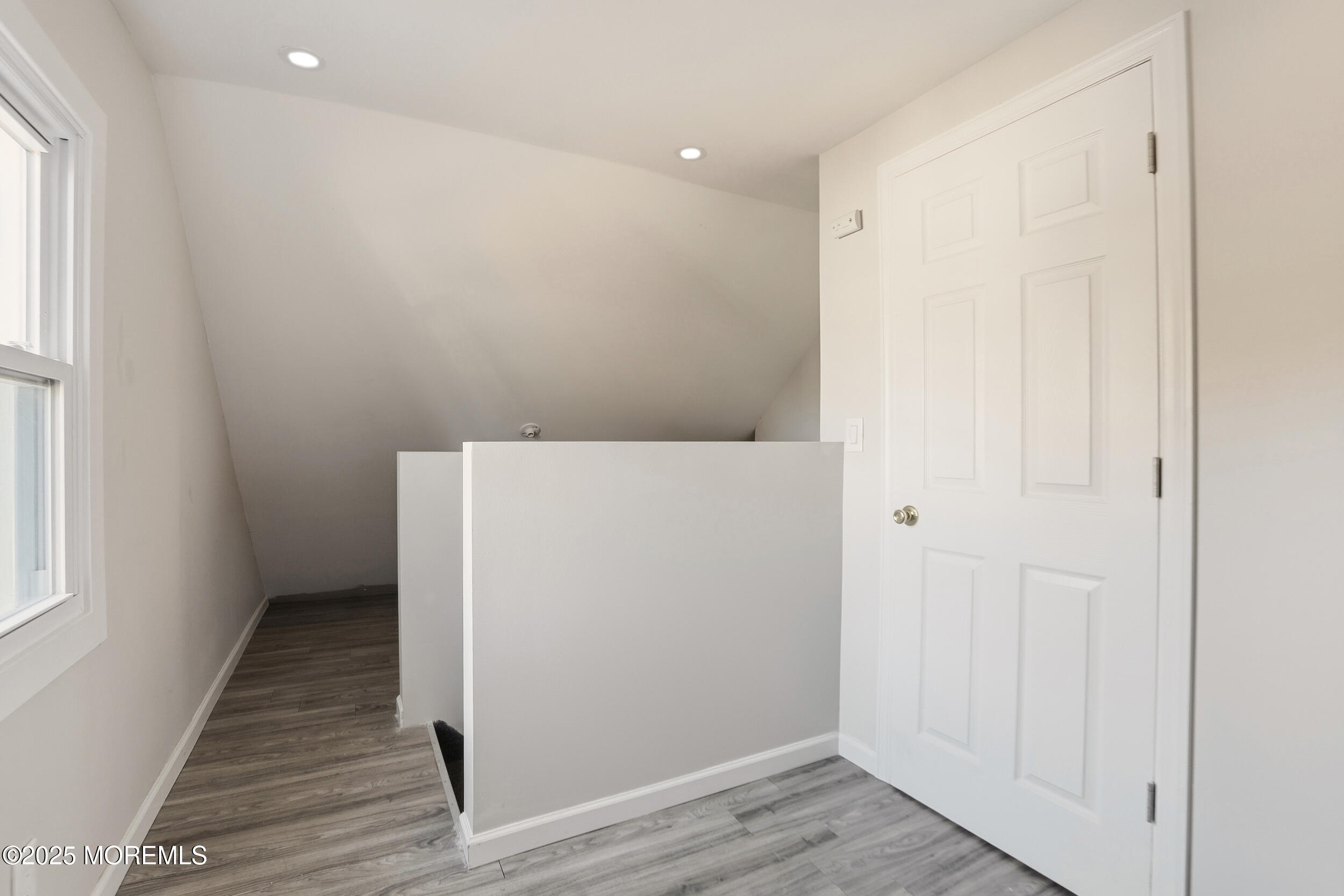 22 Oak Ridge Parkway Toms River, NJ 08755 - Photo 22 of 28 a view of hallway with wooden floor