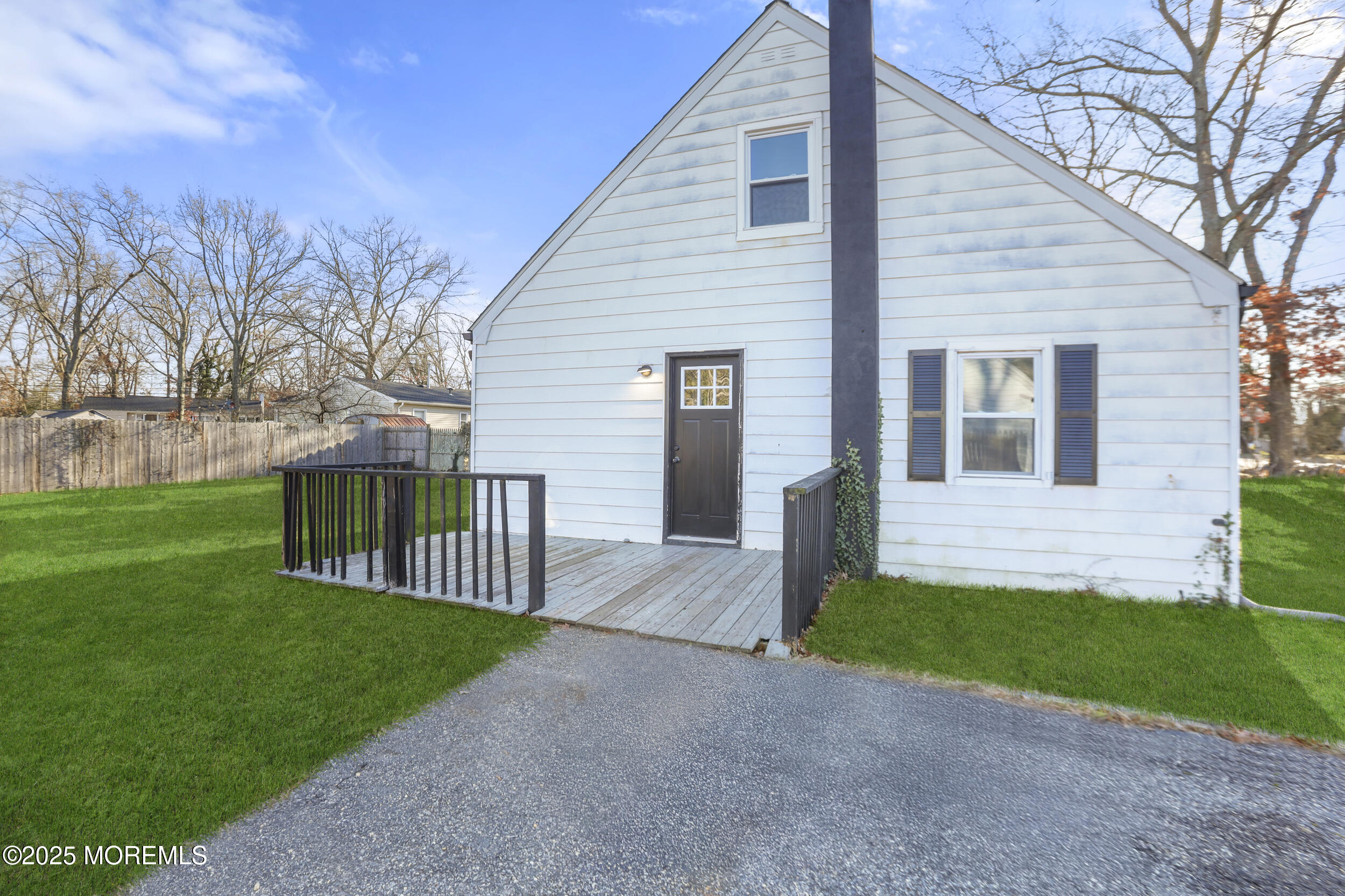22 Oak Ridge Parkway Toms River, NJ 08755 - Photo 27 of 28 a view of a house with a yard and pathway