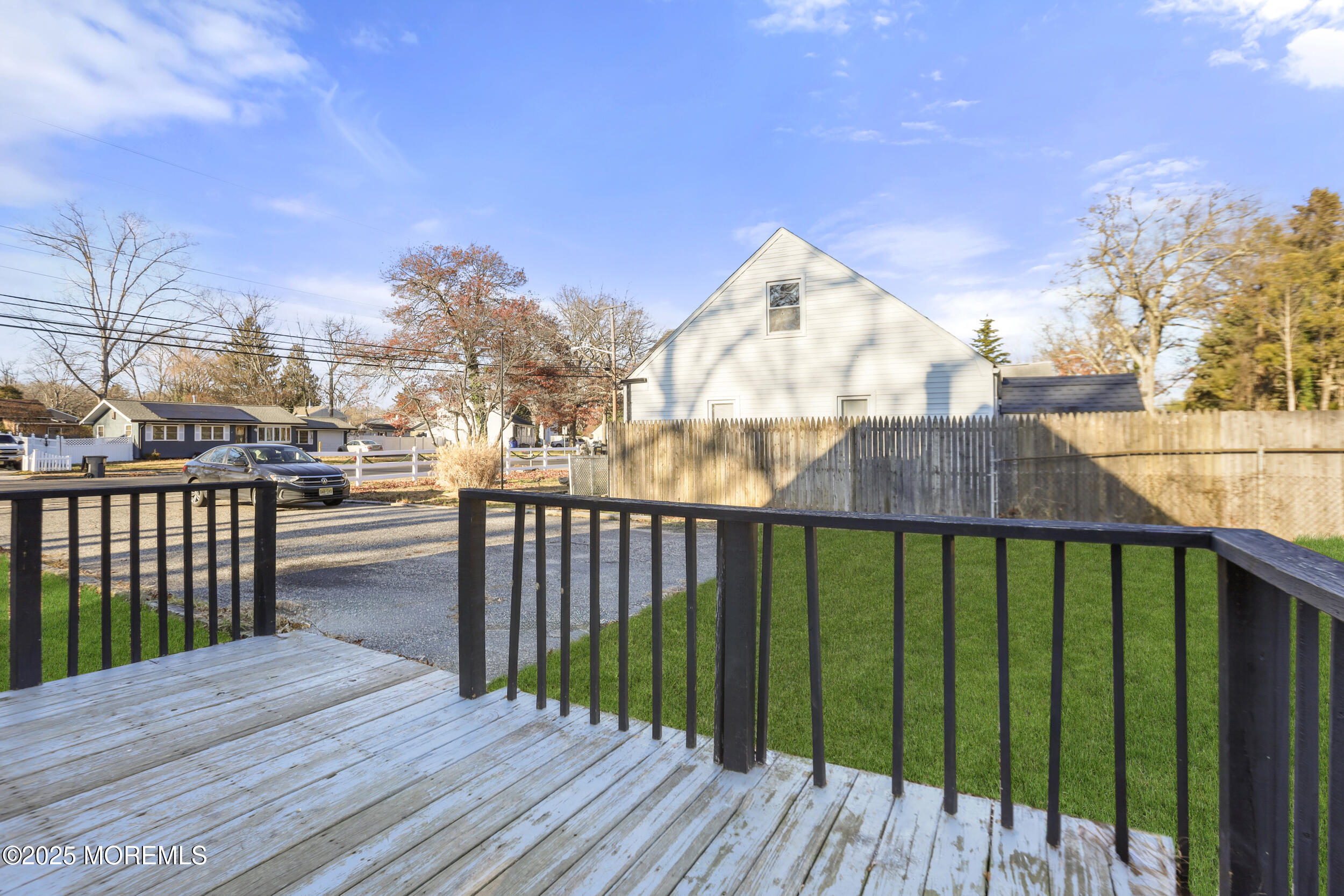 22 Oak Ridge Parkway Toms River, NJ 08755 - Photo 4 of 28 a view of a balcony with wooden floor