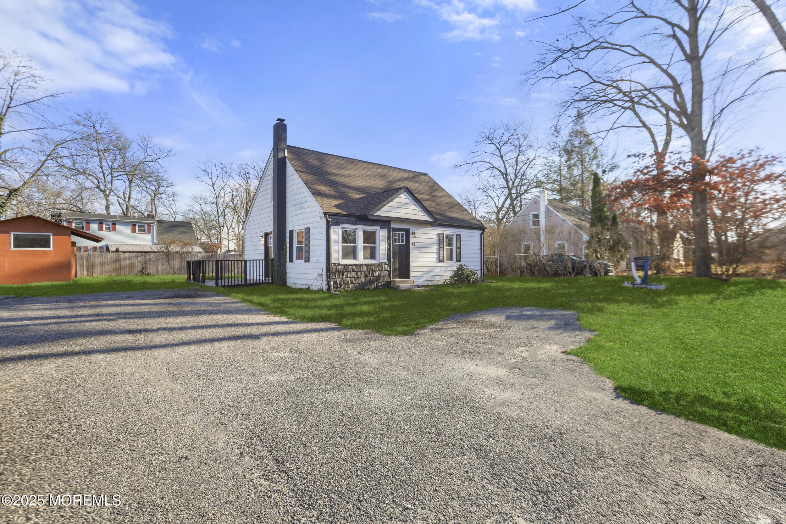 22 Oak Ridge Parkway Toms River, NJ 08755 - Photo 4 of 28 a view of a house with a yard