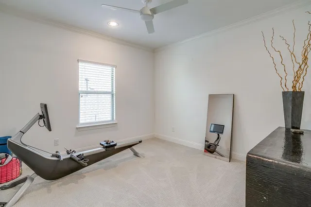 a room with a window and gym equipment