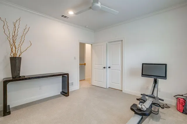 a view of room with gym equipment
