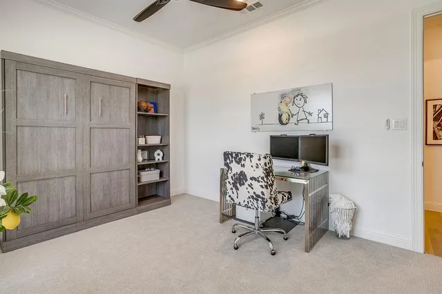 a view of a workspace with furniture