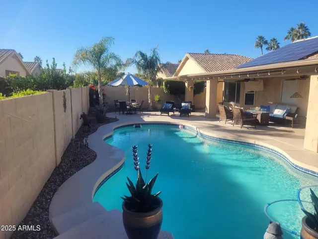 a view of backyard with wooden floor