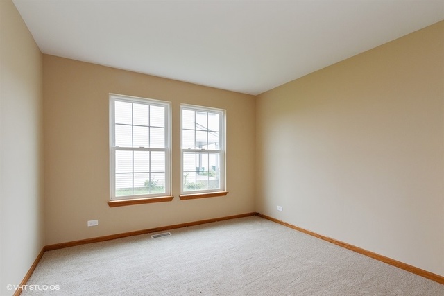 2224 Ridge Drive Hebron, IL 60034 - Photo 15 of 29 an empty room with windows