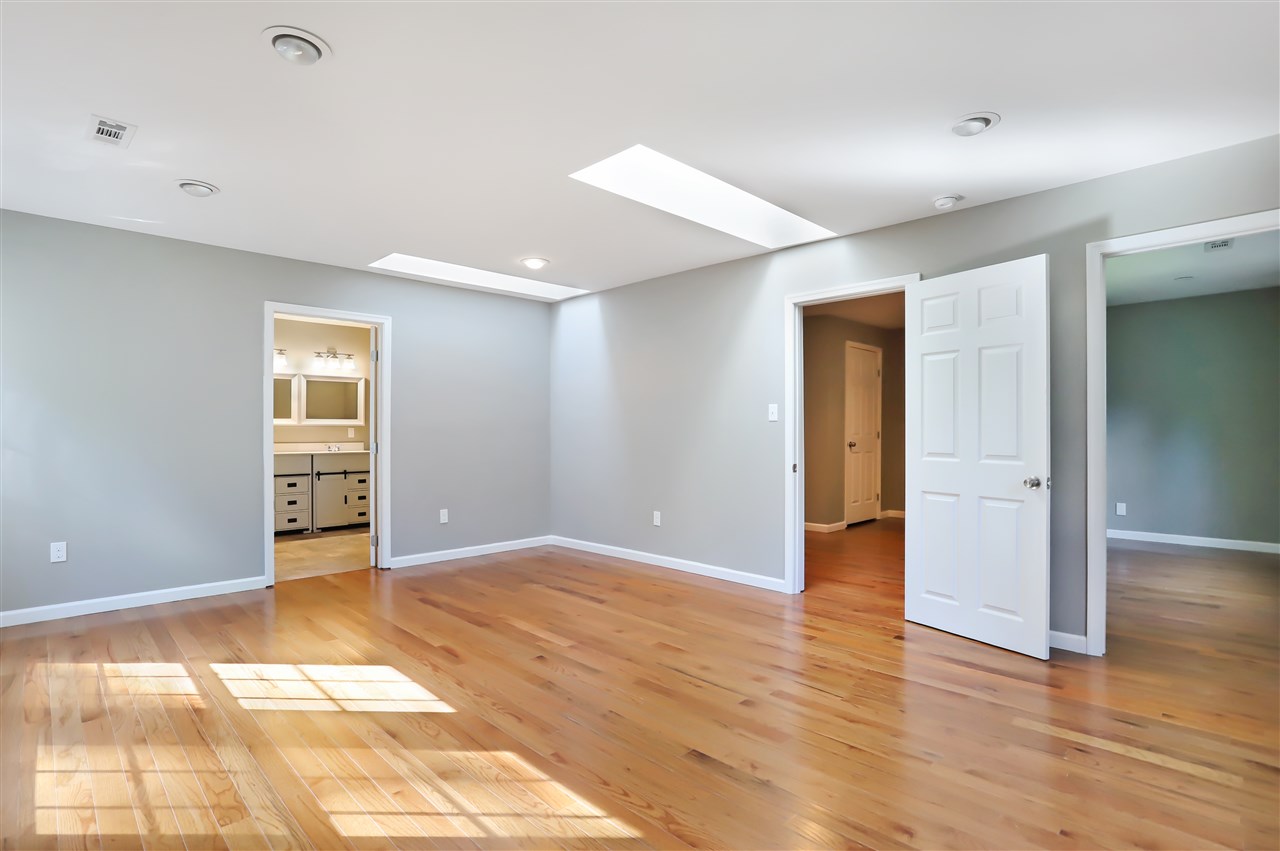 178 Outpost Road Luray, VA 22835 - Photo 6 of 14 a view of an empty room with wooden floor and a window