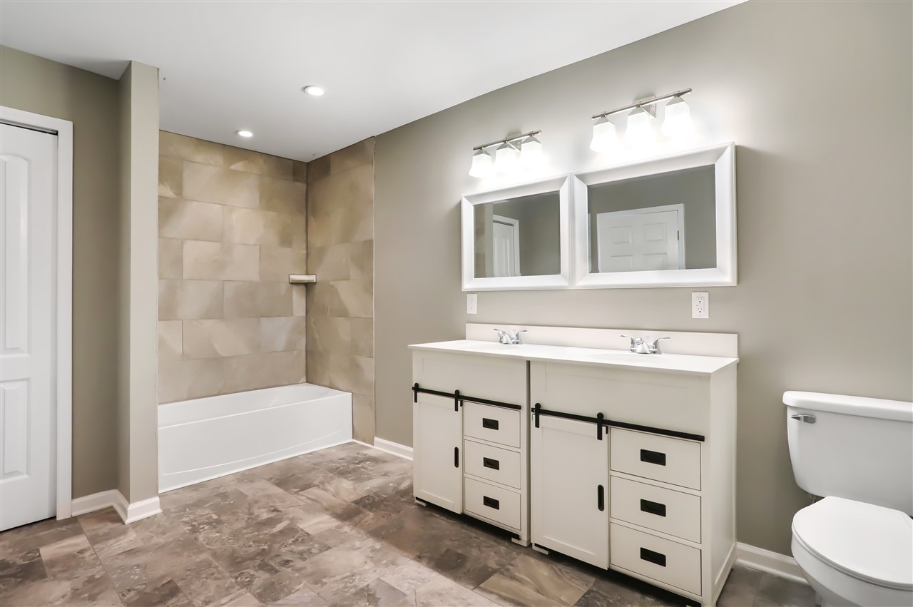 178 Outpost Road Luray, VA 22835 - Photo 7 of 14 a bathroom with a sink a toilet and bathtub