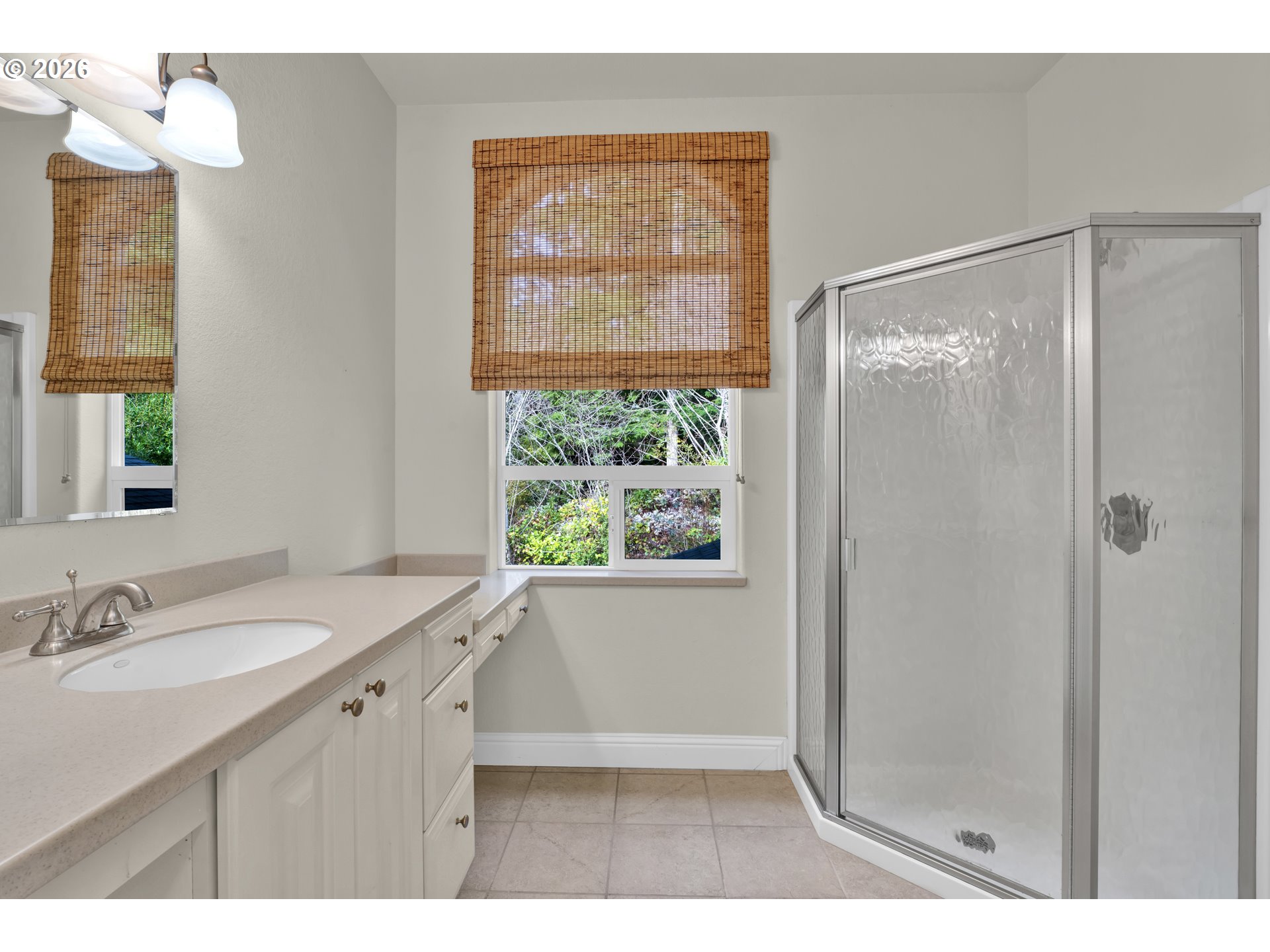 5816 Martin Road Florence, OR 97439 - Photo 36 of 47 a bathroom with a sink mirror and a shower