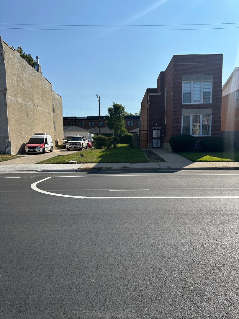 a view of street with large buildings