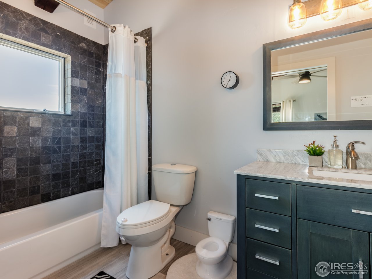 1136 Steamboat Valley Road Lyons, CO 80540 - Photo 19 of 40 Main Level Bathroom