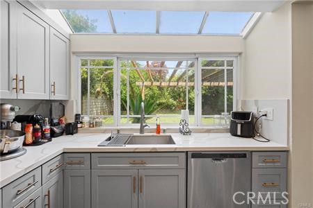 19849 Crystal Ridge Lane Porter Ranch, CA 91326 - Photo 13 of 29 a kitchen with a sink and a window