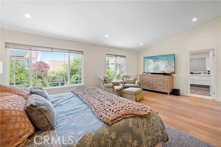 19849 Crystal Ridge Lane Porter Ranch, CA 91326 - Photo 18 of 29 a spacious bedroom with a large bed and a large window
