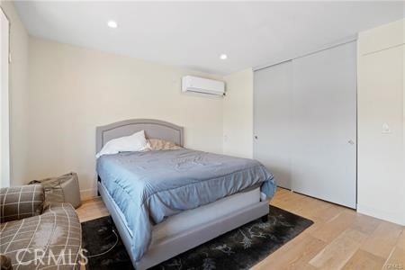 19849 Crystal Ridge Lane Porter Ranch, CA 91326 - Photo 22 of 29 a bedroom with a bed and a couch