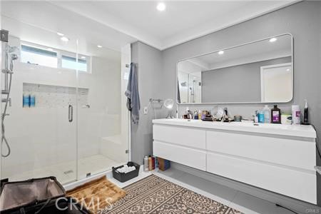 19849 Crystal Ridge Lane Porter Ranch, CA 91326 - Photo 23 of 29 a bathroom with a sink and a mirror