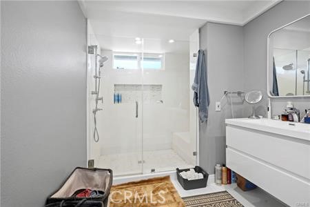 19849 Crystal Ridge Lane Porter Ranch, CA 91326 - Photo 24 of 29 a bathroom with a sink and a mirror