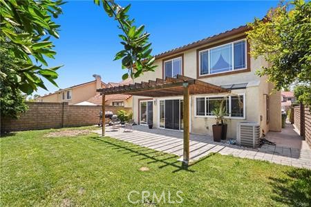 19849 Crystal Ridge Lane Porter Ranch, CA 91326 - Photo 29 of 29 a view of a house with a yard and sitting area