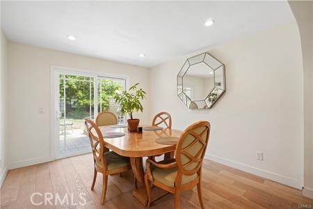 19849 Crystal Ridge Lane Porter Ranch, CA 91326 - Photo 7 of 29 a dining room with furniture and a window
